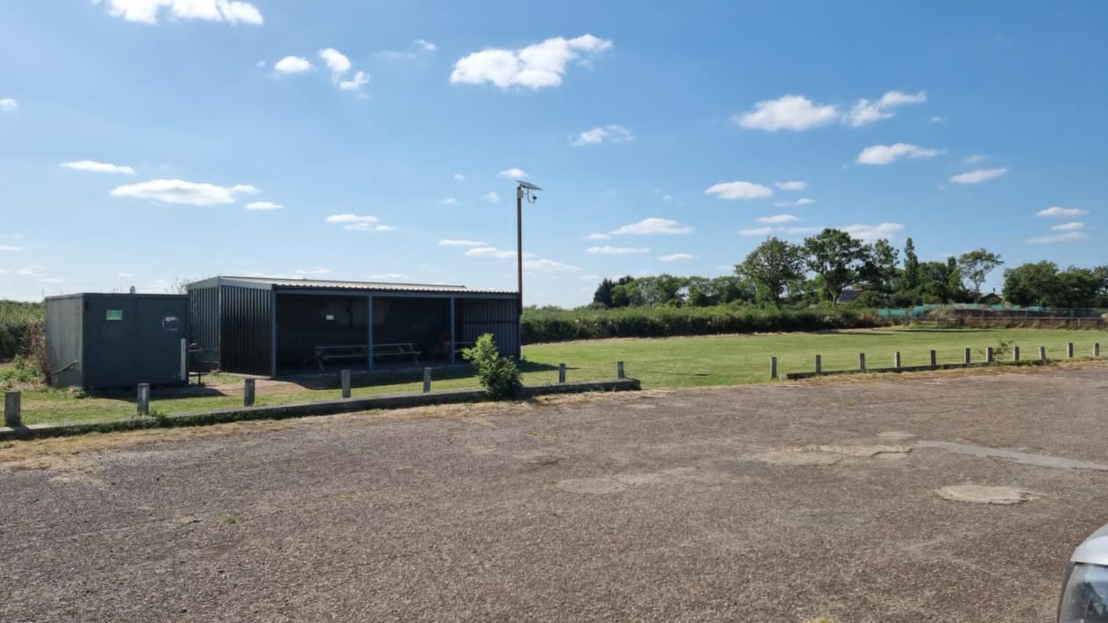 The grass and hard standing area used for parking and club events